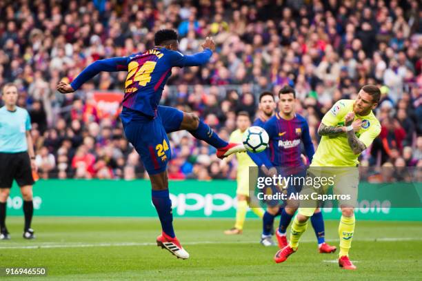 Yerry Mina of FC Barcelona sees his shot blocked by Vitorino Antunes of Getafe CF during the La Liga match between Barcelona and Getafe at Camp Nou...