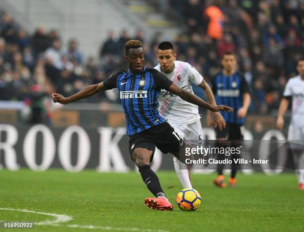 Yann Karamoh of FC Internazionale competes for the ball with Erick Pulgar of Bologna FC during the serie A match between FC Internazionale and...