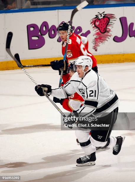 Nick Shore of the Los Angeles Kings skates for possession against Denis Malgin of the Florida Panthers at the BB&T Center on February 9, 2018 in...