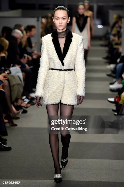 Model walks the runway at the Alexander Wang Autumn Winter 2018 fashion show during New York Fashion Week on February 10, 2018 in New York, United...