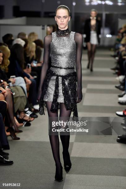 Model walks the runway at the Alexander Wang Autumn Winter 2018 fashion show during New York Fashion Week on February 10, 2018 in New York, United...