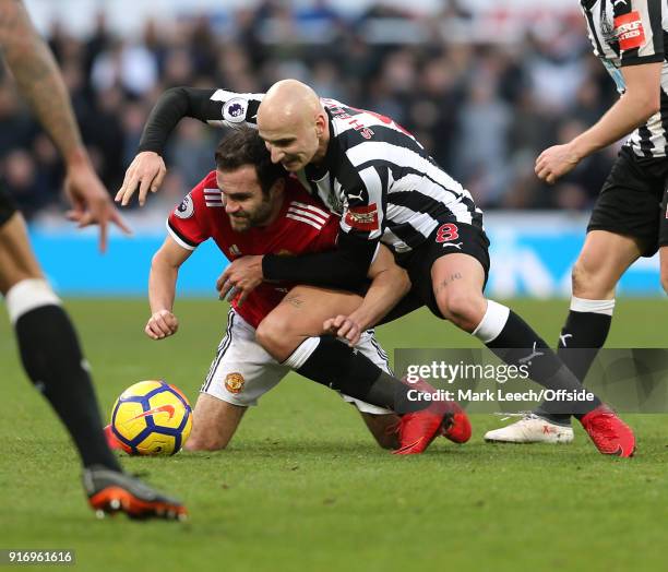 Juan Mata of Man Utd is tackled by Jonjo Shelvey of Newcastle during the Premier League match between Newcastle United and Manchester United at St....