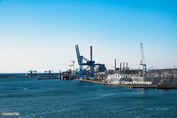 cargo cranes dockside at civitavecchia port, rome - claire plumridge fotografías e imágenes de stock