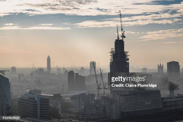 cranes visible against the london skyline - taken from the top of st pauls cathedral - claire plumridge fotografías e imágenes de stock