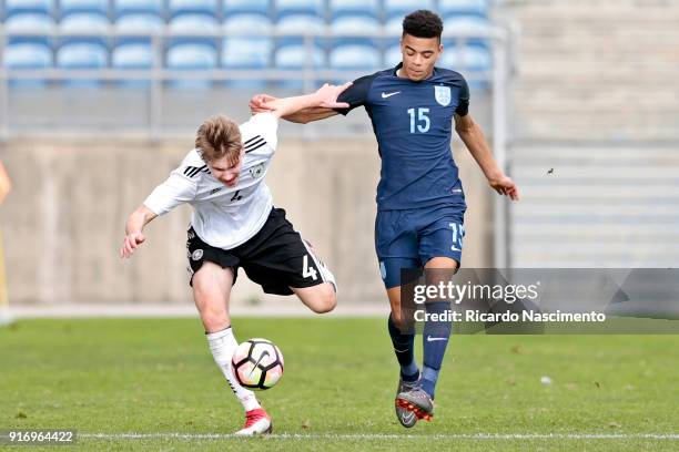 Niclas Knoop of Germany U17 chalenges Mason Greenwood of England U17 during U17-Juniors Algarve Cup match between U17 Germany and U17 England at...