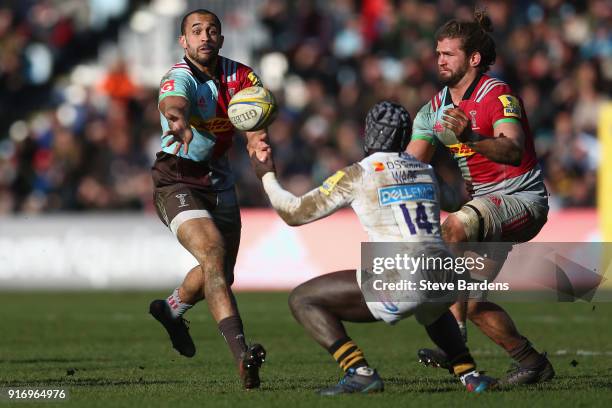 Aaron Morris passes the ball to Luke Wallace of Harlequins during the Aviva Premiership match between Harlequins and Wasps at Twickenham Stoop on...