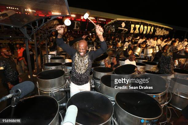 Member of the Exodus Steel Orchestra performs during the Panorama Finals competition in the Queen's Park Savannah on Feb 10, 2018 in Port of Spain,...