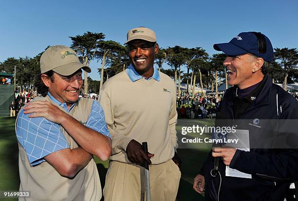 Tim Clark & Vijay Singh do a Golf Channel interview on the 18th green after the second round four-ball matches for The Presidents Cup at Harding Park...