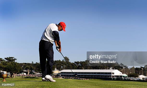 Tiger Woods hits a drive during the second round four-ball matches for The Presidents Cup at Harding Park Golf Club on October 9, 2009 in San...