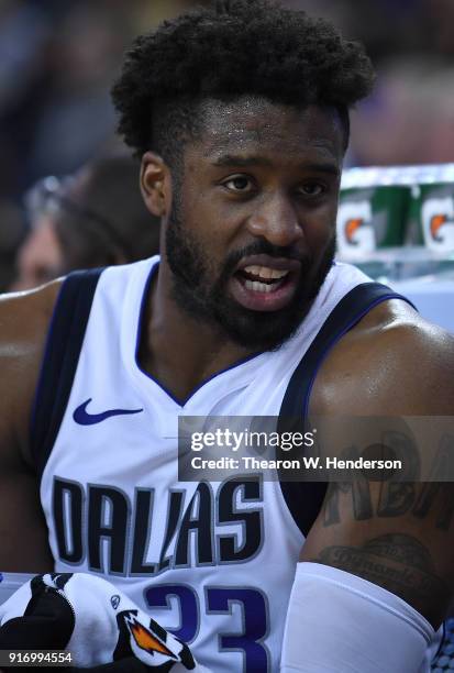 Wesley Matthews of the Dallas Mavericks looks on from the bench against the Golden State Warriors during an NBA basketball game at ORACLE Arena on...