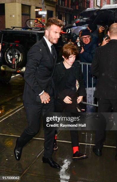 David Beckham,Cruz Beckham are seen arriving at Balthazar Restaurant in Soho on February 11, 2018 in New York City.