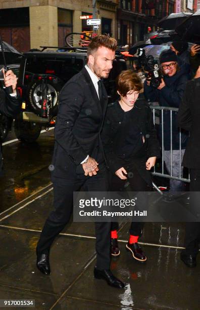 David Beckham,Cruz Beckham are seen arriving at Balthazar Restaurant in Soho on February 11, 2018 in New York City.