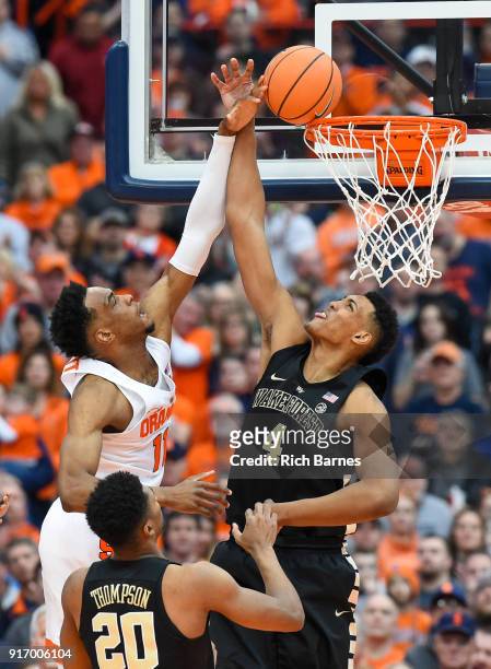 Oshae Brissett of the Syracuse Orange attempts to dunk the ball against the defense of Doral Moore of the Wake Forest Demon Deacons during the first...