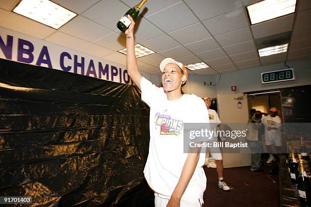 Tangela Smith of the Phoenix Mercury celebrates after defeating the Indiana Fever during Game Five of the WNBA Finals on October 9, 2009 at US...