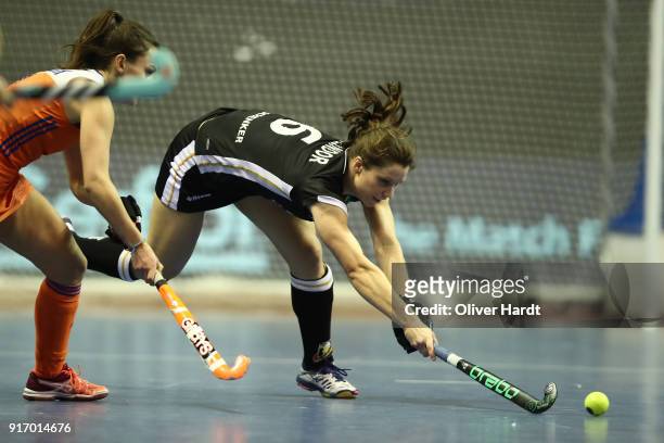 Luisa Steindor of Germany and Kiki van Wijk of Netherlands during the Women Gold Medal Indoor Hockey World Cup Berlin Final Day match between Germany...