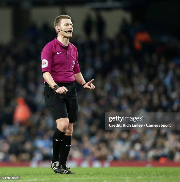 Referee Mike Jones during the Premier League match between Manchester City and Leicester City at Etihad Stadium on February 10, 2018 in Manchester,...