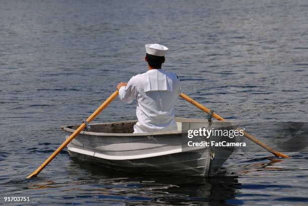 rowboat sailor - lifeboat stock pictures, royalty-free photos & images