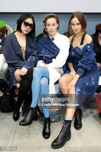 Models Natasha Lau, Elliott Sailors and Elena Carriere attend the Gemma Hoi front row during New York Fashion Week: The Shows at Mercedes-Benz...