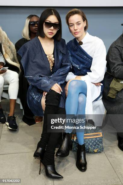 Models Natasha Lau and Elliott Sailors attend the Gemma Hoi front row during New York Fashion Week: The Shows at Mercedes-Benz Manhattan on February...