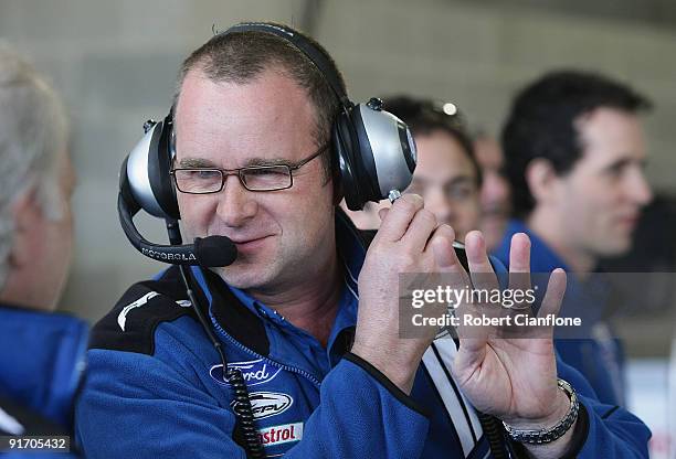 Tim Edwards team principal for Ford Performance Racing talks to Dave Richards owner of Pro Drive during qualifying for the Bathurst 1000, which is...