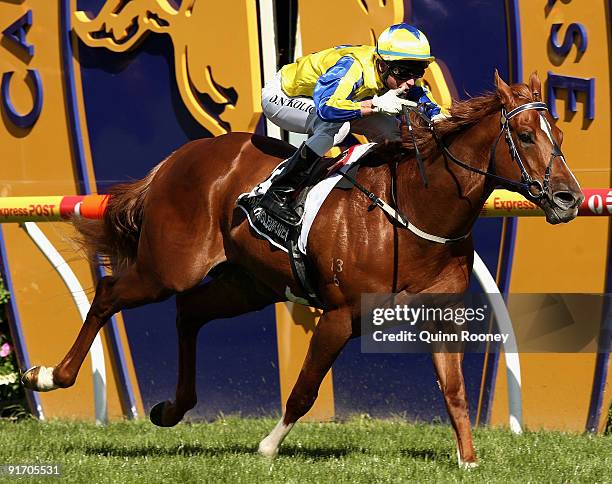 Danny Nikolic riding Starspangledbanner crosses the line to win The Age Caulfield Guineas during Caulfield Guineas Day at Caulfield Racecourse on...