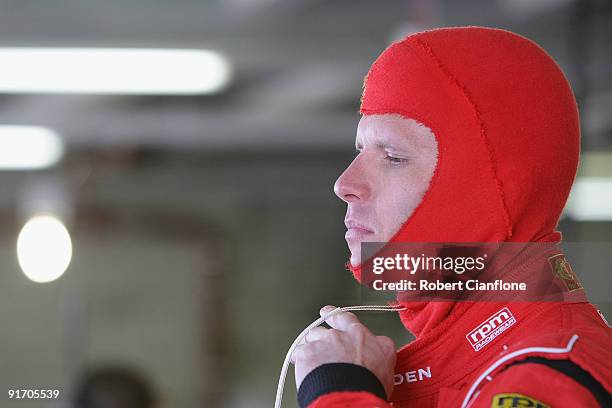 Garth Tander driver of Holden Racing Team Holden prepares to qualify for the Bathurst 1000, which is round 10 of the V8 Supercars Championship Series...