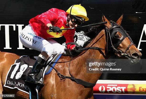 Michelle Payne riding Allez Wonder crosses the line to win the David Jones Toorak Handicap during Caulfield Guineas Day at Caulfield Racecourse on...