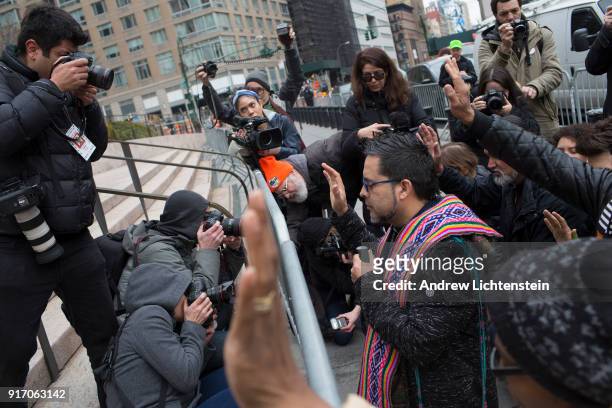 The New Sanctuary Coalition founder Juan Carlos Ruiz leads faith leaders in prayer in front of Federal Plaza to celebrate immigrant activist Ravi...