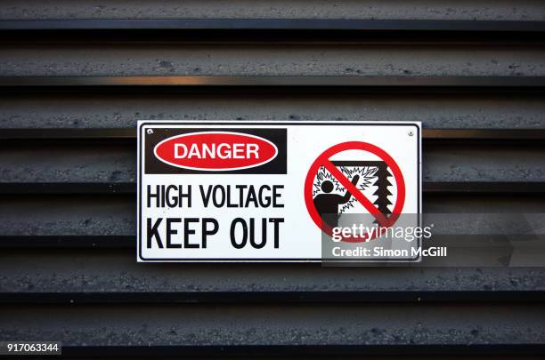 danger: high voltage - keep out sign - osha hazard communication pictogram stock pictures, royalty-free photos & images