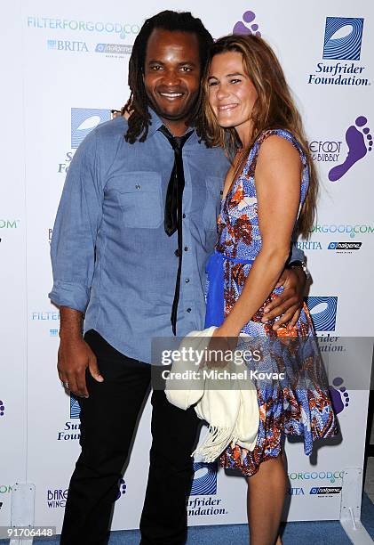 Host Sal Masekela and Lauren Ross arrive at The Surfrider Foundation's 25th Anniversary Gala at California Science Center's Wallis Annenberg Building...