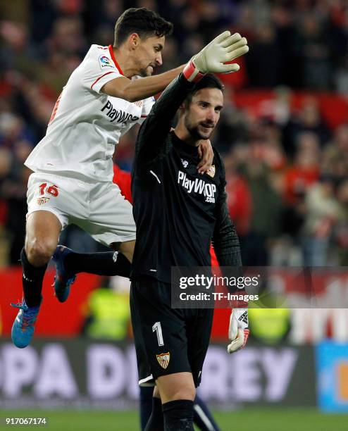 Sergio Rico of Sevilla and Jesus Navas of Sevilla celebrate after winning the Copa del Rey semi-final second leg match between Sevilla FC and CD...