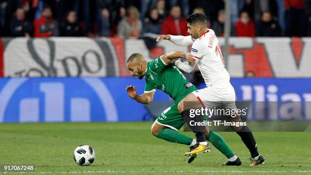 Ever Banega of Sevilla and El Zhar of Leganes battle for the ball during the Copa del Rey semi-final second leg match between Sevilla FC and CD...