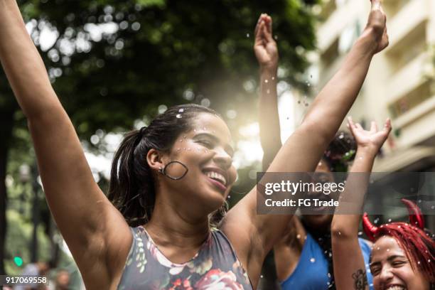 young group having fun at the carnival street - block party stock pictures, royalty-free photos & images