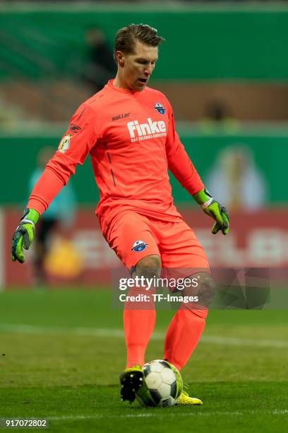 Goalkeeper Michael Ratajczak of Paderborn controls the ball during the DFB Cup match between SC Paderborn and Bayern Muenchen at Benteler Arena on...