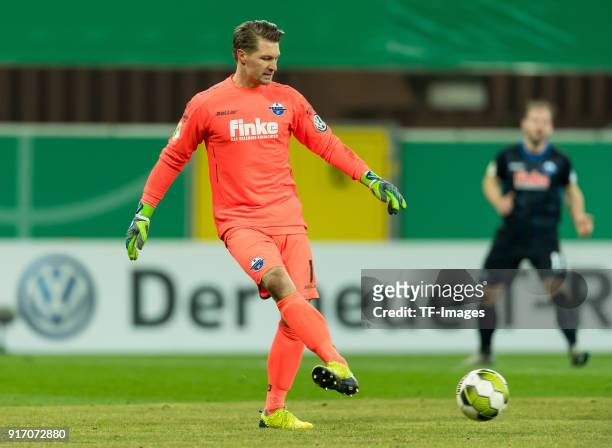 Goalkeeper Michael Ratajczak of Paderborn controls the ball during the DFB Cup match between SC Paderborn and Bayern Muenchen at Benteler Arena on...