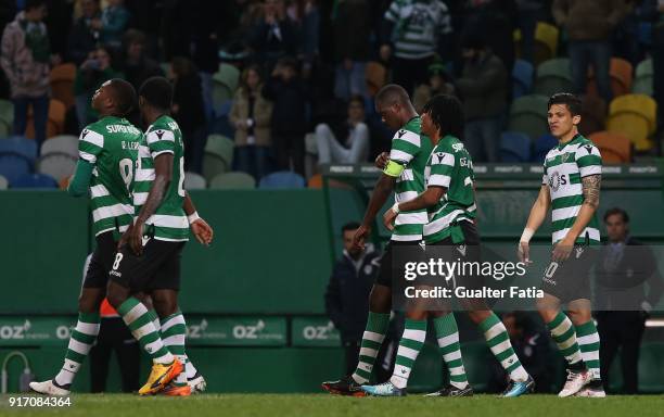 Sporting CP midfielder William Carvalho from Portugal celebrates with teammates after scoring a goal during the Primeira Liga match between Sporting...