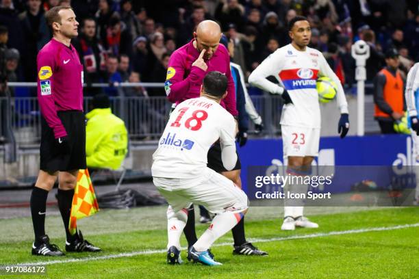 Nabil Fekir of Lyon and Referee Amaury Delerue during the Ligue 1 match between Olympique Lyonnais and Stade Rennes at Parc Olympique on February 11,...