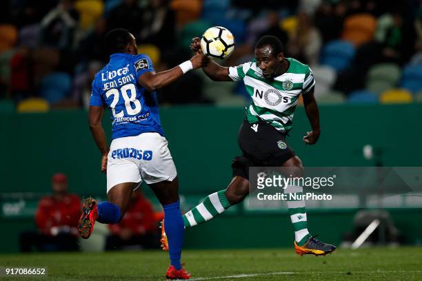 Sporting's forward Seydou Doumbia vies for the ball with Feirense's midfielder Jean Alcenat during Primeira Liga 2017/18 match between Sporting CP vs...