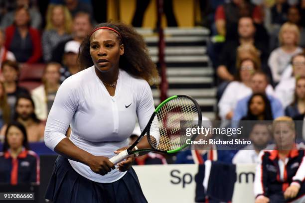 Serena Williams of Team USA reacts after a shot to Lesley Kerkhove and Demi Schuurs of the Netherlands during a doubles match in the first round of...