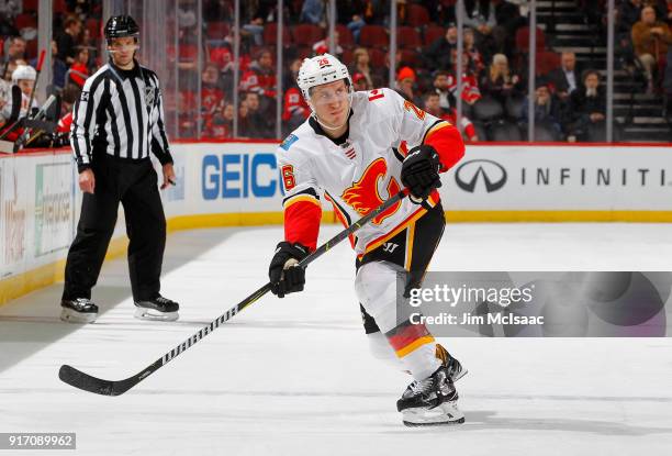 Michael Stone of the Calgary Flames in action against the New Jersey Devils on February 8, 2018 at Prudential Center in Newark, New Jersey. The...