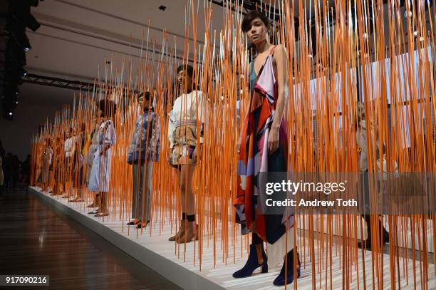 Models pose for Tanya Taylor presentation during New York Fashion Week: The Shows at Gallery II at Spring Studios on February 11, 2018 in New York...