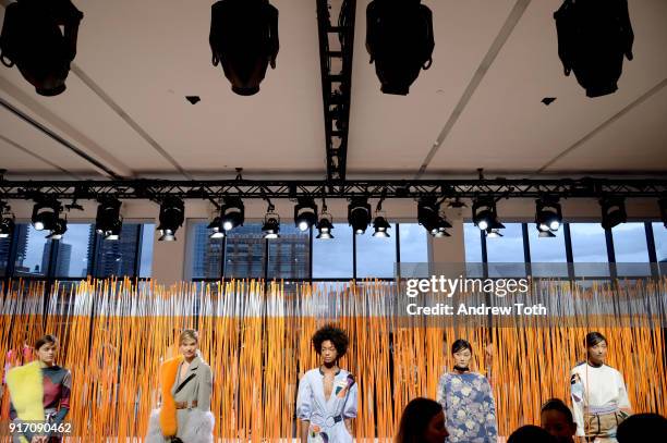 Models pose for Tanya Taylor presentation during New York Fashion Week: The Shows at Gallery II at Spring Studios on February 11, 2018 in New York...