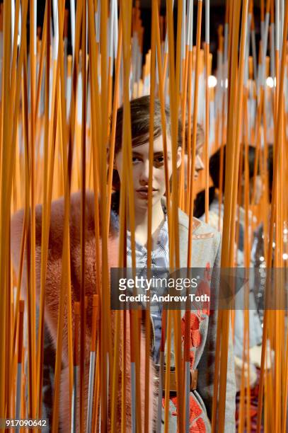 Model poses for Tanya Taylor presentation during New York Fashion Week: The Shows at Gallery II at Spring Studios on February 11, 2018 in New York...