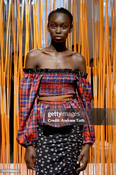 Model poses for Tanya Taylor presentation during New York Fashion Week: The Shows at Gallery II at Spring Studios on February 11, 2018 in New York...