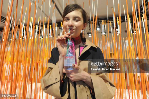 Model poses with Evian water during the Tanya Taylor presentation in Gallery II during IMG NYFW: The Shows at Spring Studios on February 11, 2018 in...