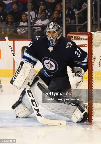 Winnipeg Jets Goalie Connor Hellebuyck follows the play during a NHL game between the Winnipeg Jets and New York Rangers on February 11, 2018 at Bell...