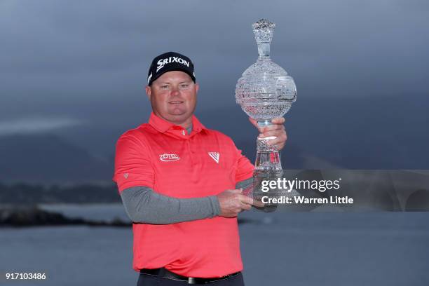 Ted Potter Jr. Poses with the trophy after winning the AT&T Pebble Beach Pro-Am at Pebble Beach Golf Links on February 11, 2018 in Pebble Beach,...