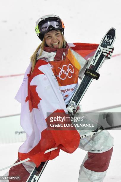 Canada's Justine Dufour-Lapointe celebrates during the victory ceremony after the women's moguls final event during the Pyeongchang 2018 Winter...