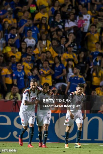 Jeremy Menez of America celebrates with teammates after scoring the equalizer via penalty during the 6th round match between Tigres UANL and America...