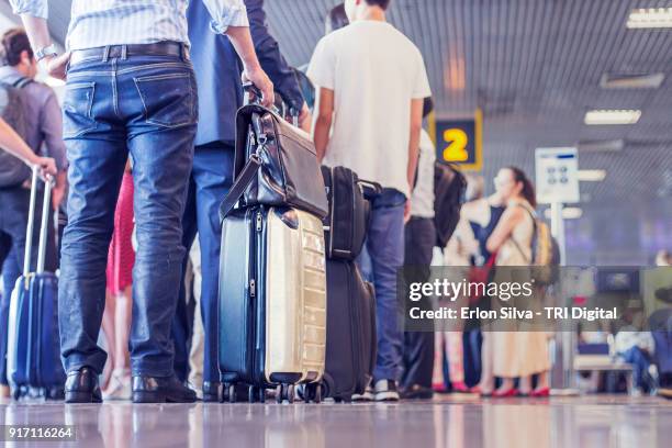 airport people waiting in the line - airport ストックフォトと画像